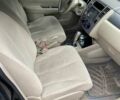 Черный Ниссан Тиида, объемом двигателя 1.6 л и пробегом 200 тыс. км за 4500 $, фото 4 на Automoto.ua