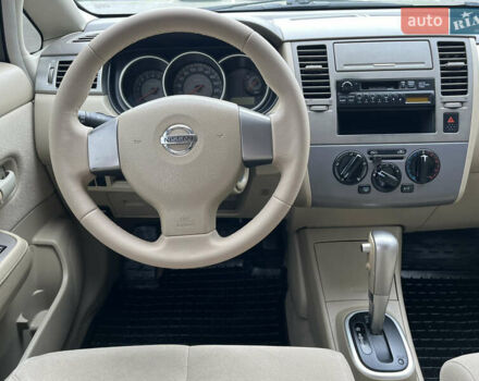 Черный Ниссан Тиида, объемом двигателя 1.6 л и пробегом 172 тыс. км за 6900 $, фото 23 на Automoto.ua