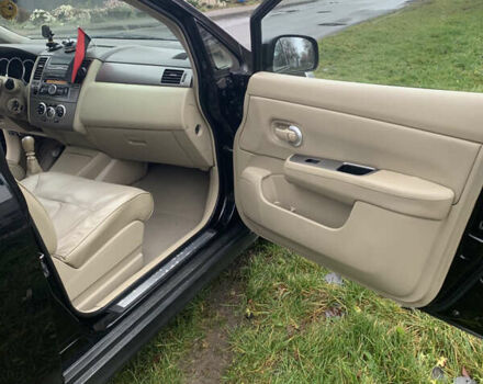 Черный Ниссан Тиида, объемом двигателя 1.46 л и пробегом 261 тыс. км за 5400 $, фото 14 на Automoto.ua