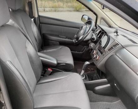 Черный Ниссан Тиида, объемом двигателя 1.6 л и пробегом 2 тыс. км за 6200 $, фото 4 на Automoto.ua