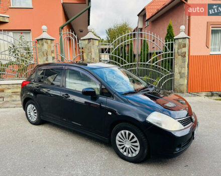 Черный Ниссан Тиида, объемом двигателя 1.6 л и пробегом 187 тыс. км за 5800 $, фото 56 на Automoto.ua