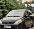 Черный Ниссан Тиида, объемом двигателя 1.6 л и пробегом 210 тыс. км за 4700 $, фото 1 на Automoto.ua