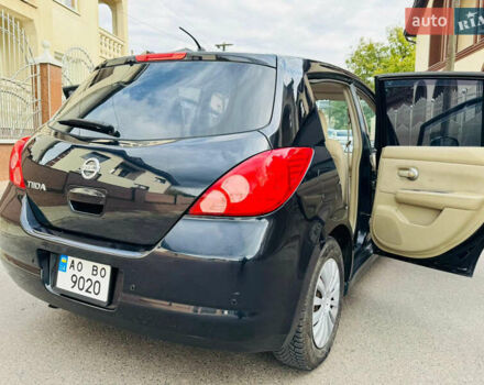 Черный Ниссан Тиида, объемом двигателя 1.6 л и пробегом 187 тыс. км за 5800 $, фото 45 на Automoto.ua