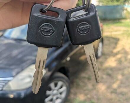 Черный Ниссан Тиида, объемом двигателя 1.6 л и пробегом 209 тыс. км за 4400 $, фото 2 на Automoto.ua