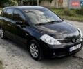 Черный Ниссан Тиида, объемом двигателя 1.6 л и пробегом 150 тыс. км за 5000 $, фото 1 на Automoto.ua