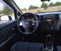 Черный Ниссан Тиида, объемом двигателя 1.6 л и пробегом 196 тыс. км за 6419 $, фото 9 на Automoto.ua