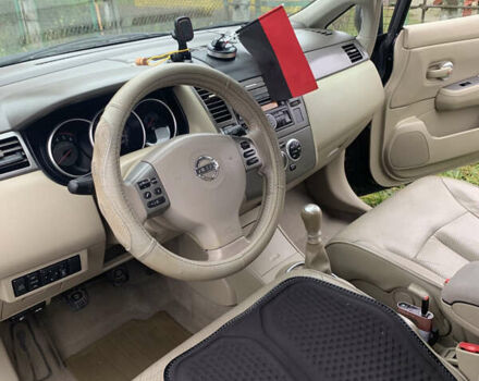 Черный Ниссан Тиида, объемом двигателя 1.46 л и пробегом 261 тыс. км за 5400 $, фото 7 на Automoto.ua