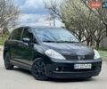 Черный Ниссан Тиида, объемом двигателя 1.6 л и пробегом 210 тыс. км за 5000 $, фото 1 на Automoto.ua