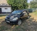 Черный Ниссан Тиида, объемом двигателя 1.6 л и пробегом 209 тыс. км за 4400 $, фото 1 на Automoto.ua