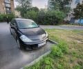 Черный Ниссан Тиида, объемом двигателя 1.6 л и пробегом 230 тыс. км за 5200 $, фото 1 на Automoto.ua
