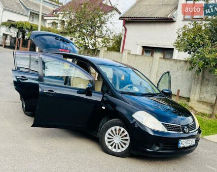 Черный Ниссан Тиида, объемом двигателя 1.6 л и пробегом 187 тыс. км за 5800 $, фото 52 на Automoto.ua