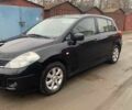 Черный Ниссан Тиида, объемом двигателя 1.5 л и пробегом 261 тыс. км за 5500 $, фото 1 на Automoto.ua