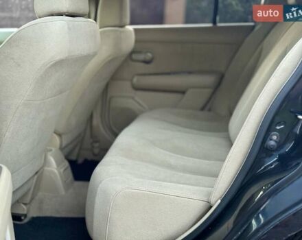 Черный Ниссан Тиида, объемом двигателя 1.6 л и пробегом 199 тыс. км за 5900 $, фото 18 на Automoto.ua