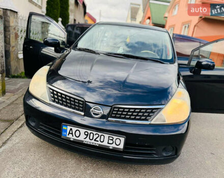 Черный Ниссан Тиида, объемом двигателя 1.6 л и пробегом 187 тыс. км за 5800 $, фото 82 на Automoto.ua