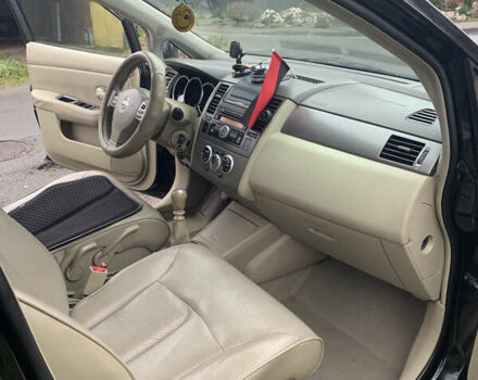 Черный Ниссан Тиида, объемом двигателя 1.46 л и пробегом 261 тыс. км за 5400 $, фото 11 на Automoto.ua