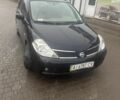 Черный Ниссан Тиида, объемом двигателя 1.6 л и пробегом 150 тыс. км за 5200 $, фото 1 на Automoto.ua