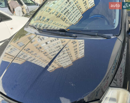 Черный Ниссан Тиида, объемом двигателя 1.6 л и пробегом 195 тыс. км за 5000 $, фото 7 на Automoto.ua