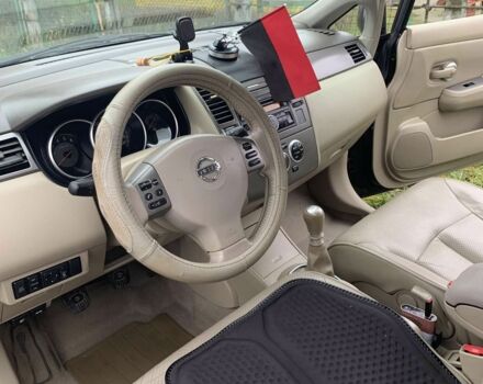 Черный Ниссан Тиида, объемом двигателя 1.5 л и пробегом 261 тыс. км за 5500 $, фото 6 на Automoto.ua