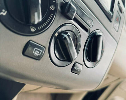 Черный Ниссан Тиида, объемом двигателя 1.6 л и пробегом 187 тыс. км за 5800 $, фото 50 на Automoto.ua