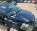 Черный Ниссан Тиида, объемом двигателя 1.8 л и пробегом 280 тыс. км за 3500 $, фото 1 на Automoto.ua