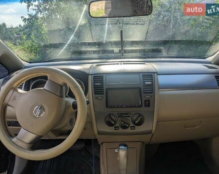 Черный Ниссан Тиида, объемом двигателя 1.6 л и пробегом 209 тыс. км за 4400 $, фото 4 на Automoto.ua