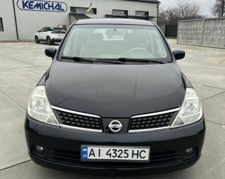 Черный Ниссан Тиида, объемом двигателя 1.6 л и пробегом 188 тыс. км за 5800 $, фото 1 на Automoto.ua