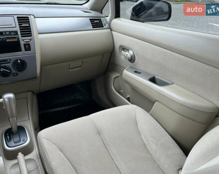 Черный Ниссан Тиида, объемом двигателя 1.6 л и пробегом 172 тыс. км за 6900 $, фото 24 на Automoto.ua