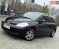 Черный Ниссан Тиида, объемом двигателя 1.6 л и пробегом 172 тыс. км за 6900 $, фото 2 на Automoto.ua