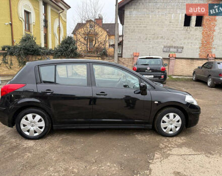 Черный Ниссан Тиида, объемом двигателя 1.8 л и пробегом 131 тыс. км за 5500 $, фото 1 на Automoto.ua