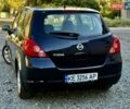 Черный Ниссан Тиида, объемом двигателя 1.6 л и пробегом 257 тыс. км за 5999 $, фото 3 на Automoto.ua