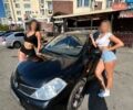 Черный Ниссан Тиида, объемом двигателя 1.6 л и пробегом 280 тыс. км за 5899 $, фото 1 на Automoto.ua