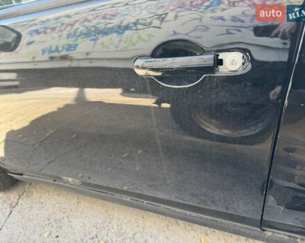 Черный Ниссан Тиида, объемом двигателя 1.6 л и пробегом 195 тыс. км за 5000 $, фото 12 на Automoto.ua