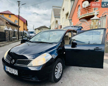 Черный Ниссан Тиида, объемом двигателя 1.6 л и пробегом 187 тыс. км за 5800 $, фото 73 на Automoto.ua