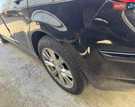 Черный Ниссан Тиида, объемом двигателя 1.6 л и пробегом 195 тыс. км за 5000 $, фото 10 на Automoto.ua