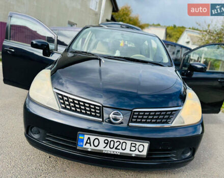 Черный Ниссан Тиида, объемом двигателя 1.6 л и пробегом 187 тыс. км за 5800 $, фото 23 на Automoto.ua