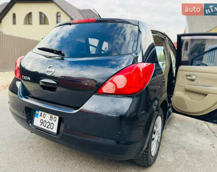 Черный Ниссан Тиида, объемом двигателя 1.6 л и пробегом 187 тыс. км за 5800 $, фото 84 на Automoto.ua