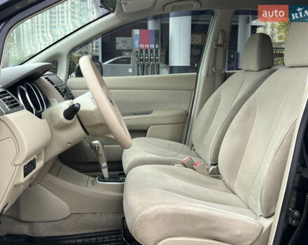 Черный Ниссан Тиида, объемом двигателя 1.6 л и пробегом 172 тыс. км за 6900 $, фото 31 на Automoto.ua