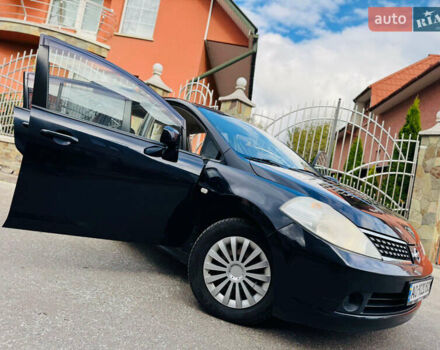Черный Ниссан Тиида, объемом двигателя 1.6 л и пробегом 187 тыс. км за 5800 $, фото 25 на Automoto.ua