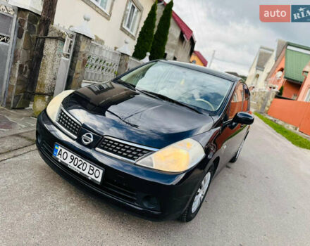 Черный Ниссан Тиида, объемом двигателя 1.6 л и пробегом 187 тыс. км за 5800 $, фото 11 на Automoto.ua