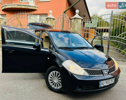 Черный Ниссан Тиида, объемом двигателя 1.6 л и пробегом 187 тыс. км за 5800 $, фото 60 на Automoto.ua