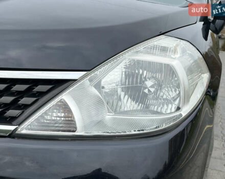 Черный Ниссан Тиида, объемом двигателя 1.6 л и пробегом 172 тыс. км за 6900 $, фото 13 на Automoto.ua