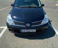 Черный Ниссан Тиида, объемом двигателя 1.6 л и пробегом 132 тыс. км за 5300 $, фото 1 на Automoto.ua