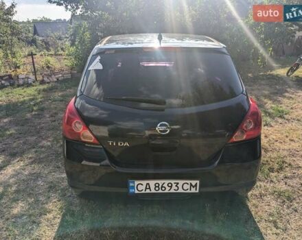 Черный Ниссан Тиида, объемом двигателя 1.6 л и пробегом 209 тыс. км за 4400 $, фото 5 на Automoto.ua