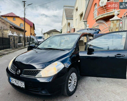 Черный Ниссан Тиида, объемом двигателя 1.6 л и пробегом 187 тыс. км за 5800 $, фото 27 на Automoto.ua