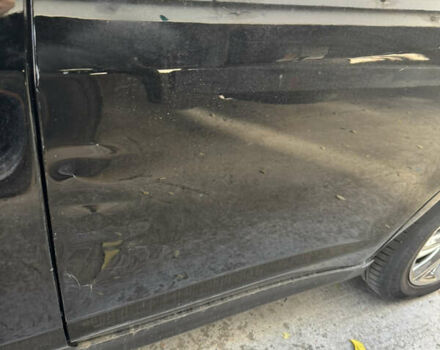 Черный Ниссан Тиида, объемом двигателя 1.6 л и пробегом 195 тыс. км за 5000 $, фото 14 на Automoto.ua