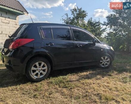 Черный Ниссан Тиида, объемом двигателя 1.6 л и пробегом 209 тыс. км за 4400 $, фото 3 на Automoto.ua