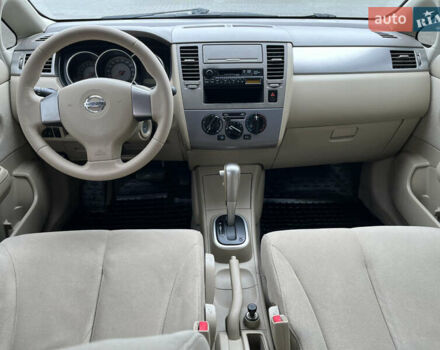 Черный Ниссан Тиида, объемом двигателя 1.6 л и пробегом 172 тыс. км за 6900 $, фото 22 на Automoto.ua