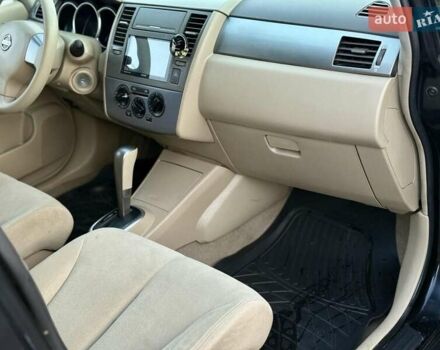 Черный Ниссан Тиида, объемом двигателя 1.6 л и пробегом 199 тыс. км за 5900 $, фото 22 на Automoto.ua