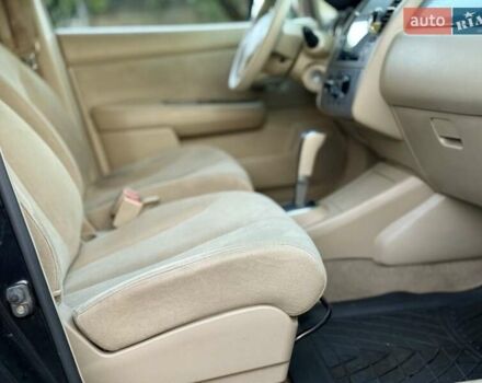 Черный Ниссан Тиида, объемом двигателя 1.6 л и пробегом 199 тыс. км за 5900 $, фото 24 на Automoto.ua