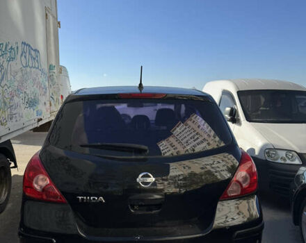 Черный Ниссан Тиида, объемом двигателя 1.6 л и пробегом 195 тыс. км за 5000 $, фото 1 на Automoto.ua